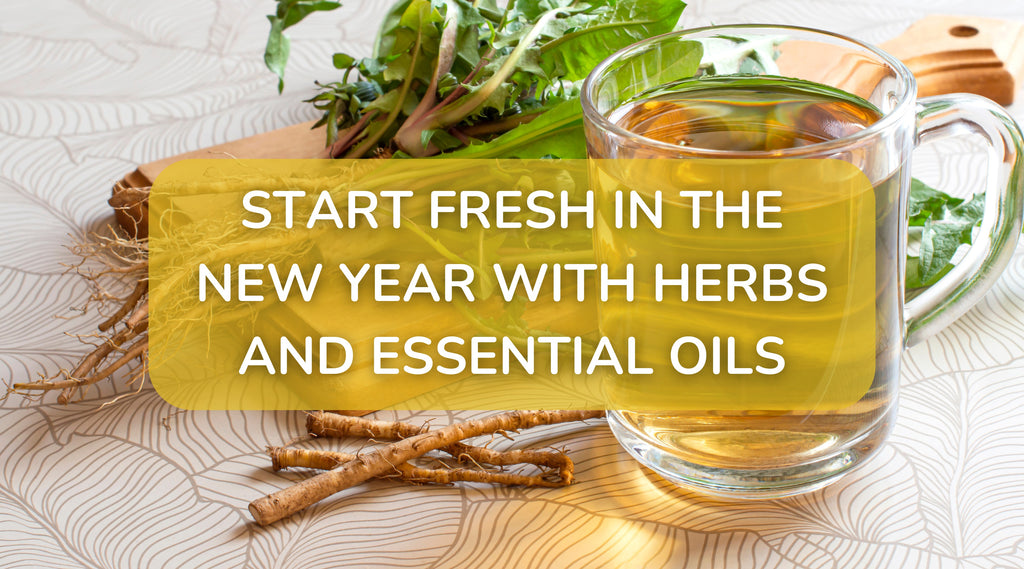 A glass cup of tea next to fresh herbs